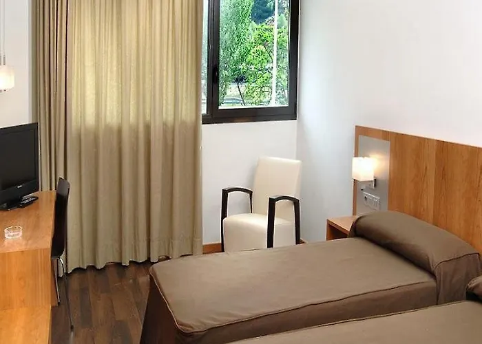 As Ξενοδοχείο